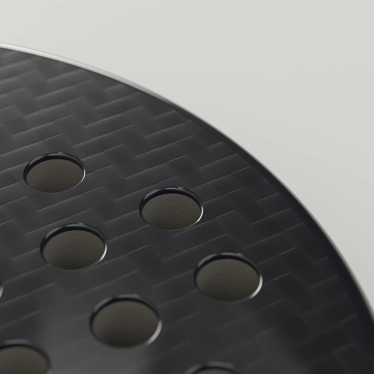 Render van het MerchPadel-racket: close-up van de gaten van 12 mm in het carbon slagvlak